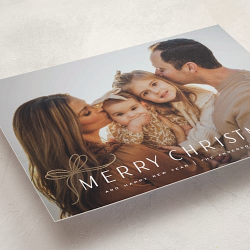 This is a candy cane foil pressed holiday cards with foil pressed by Yuliya Evseeva called cute bow printing on recycled smooth signature in standard