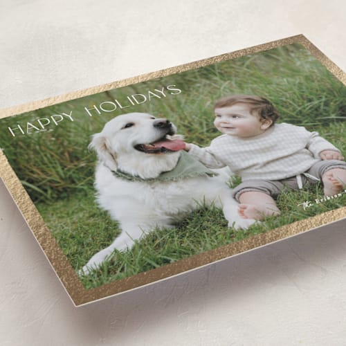 This is a sugar foil pressed holiday cards with foil pressed by Hooray Creative called gilded border printing on recycled smooth signature in standard