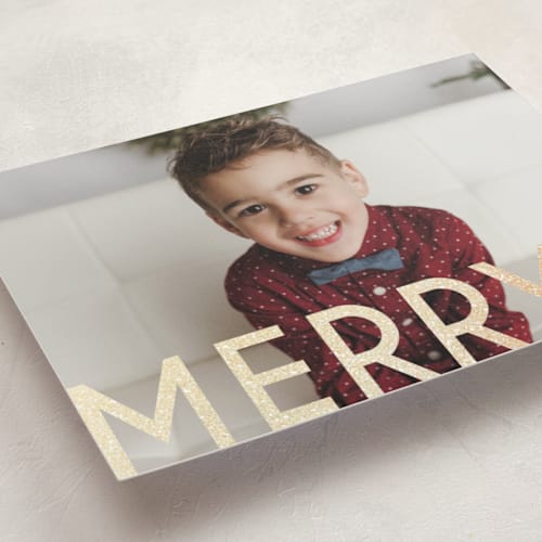 This is a vanilla foil pressed holiday cards with foil pressed by Snow and Ivy called bold type printing on recycled smooth signature in standard