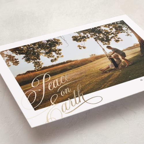 This is a snow foil pressed holiday cards with foil pressed by Yaling Hou Suzuki called peace delight printing on recycled smooth signature in standard