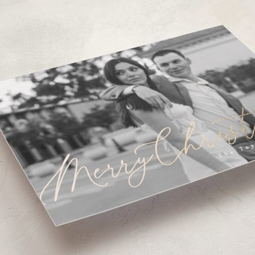 This is a snow foil pressed holiday cards with foil pressed by Julie Ley called beautiful foil script printing on recycled smooth signature in standard