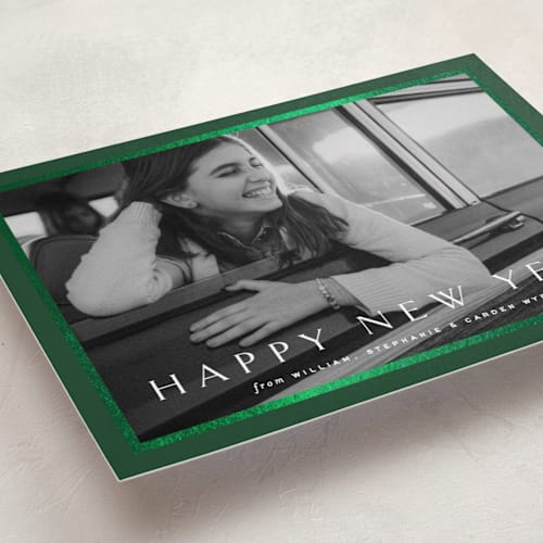 This is a pine foil pressed holiday cards with foil pressed by Amy Kross called winds printing on recycled smooth signature in standard