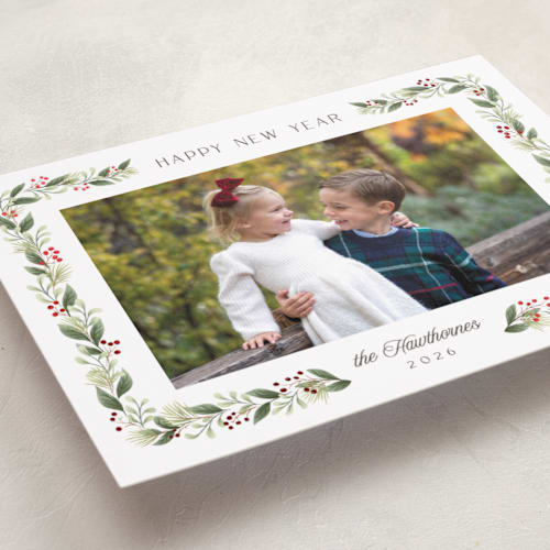 This is a holly foil pressed holiday cards with foil pressed by Randi Cirelli called berries & blooms printing on recycled smooth signature in standard