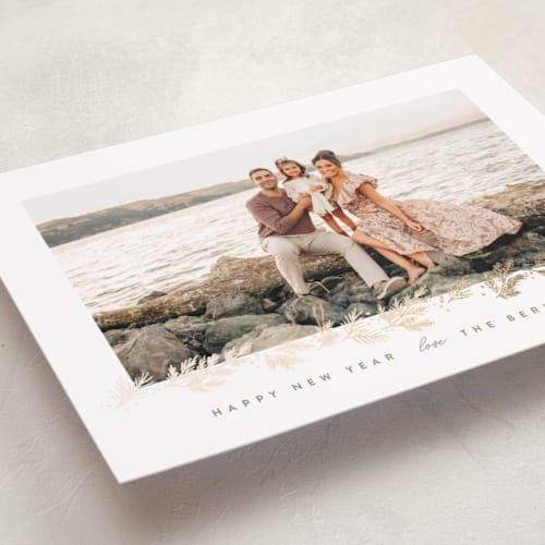 This is a snow foil pressed holiday cards with foil pressed by Rebecca Durflinger called winter garland printing on recycled smooth signature in standard