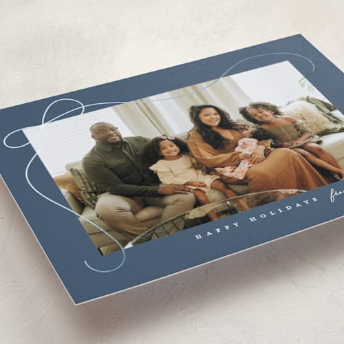 This is a marine foil pressed holiday cards with foil pressed by Lauren Chism called cascading bow printing on recycled smooth signature in standard