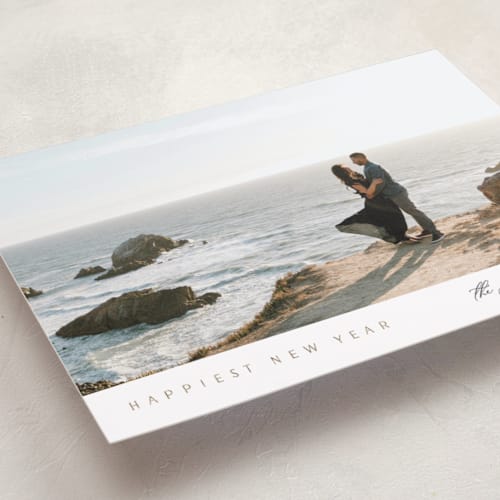 This is a cloud foil pressed holiday cards with foil pressed by Nicole Walsh called minimal edge printing on recycled smooth signature in standard
