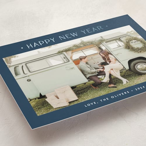 This is a navy foil pressed holiday cards with foil pressed by Carolyn MacLaren called dotted printing on recycled smooth signature in standard