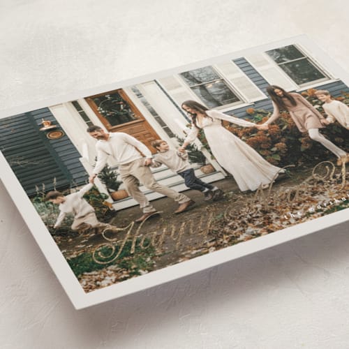 This is a marshmallow foil pressed holiday cards with foil pressed by Pati Cascino called noelle printing on recycled smooth signature in standard