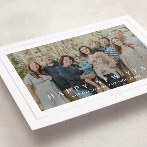 This is a snow gloss press holiday cards with gloss press by Lori Wemple called pretty bow printing on recycled smooth signature in standard