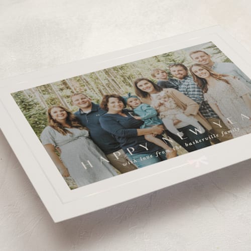 This is a cobblestone gloss press holiday cards with gloss press by Lori Wemple called pretty bow printing on recycled smooth signature in standard
