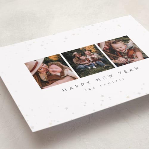 This is a night sky gloss press holiday cards with gloss press by Carolyn Nicks called confetti stars printing on recycled smooth signature in standard