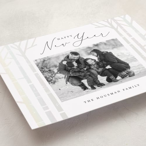 This is a snow gloss press holiday cards with gloss press by Brooke Chandler called birch trees printing on recycled smooth signature in standard