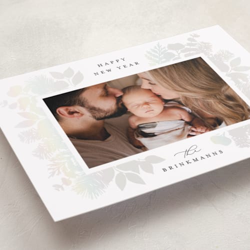This is a snow gloss press holiday cards with gloss press by Brooke Chandler called joy greenery printing on recycled smooth signature in standard