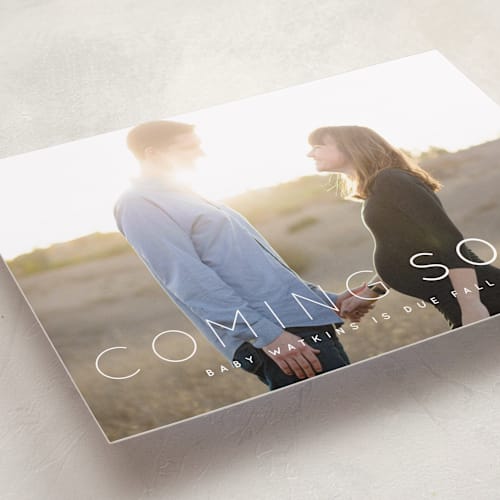 This is a cloud pregnancy announcements with standard by Roxy Cervantes called coming soon printing on smooth signature in standard