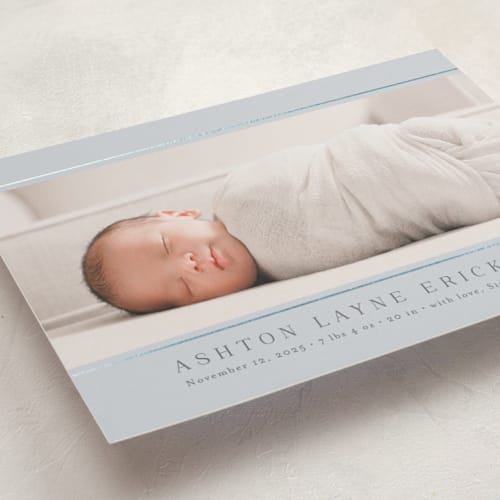 This is a denim foil stamped birth announcements with foil pressed by Jessica Williams called lined printing on signature in standard