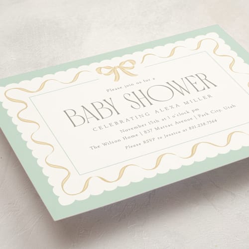 This is a mint baby shower invitations with standard by Robert and Stella called ribbon toss printing on signature in standard