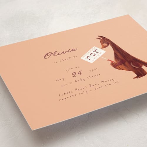 This is a peach baby shower invitations with standard by Gwen Bedat called kangaroo pop printing on signature in standard