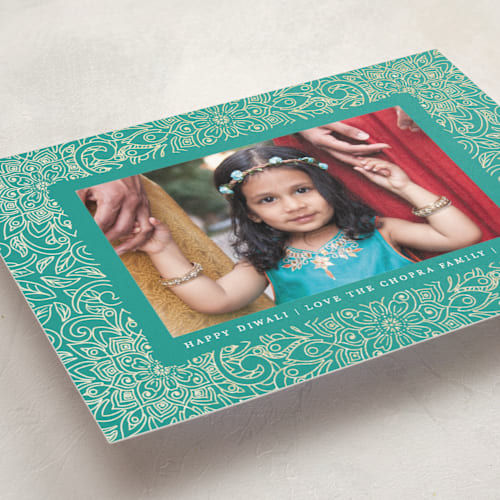 This is a turquoise diwali cards with foil pressed by Becky Nimoy called diwali medallions printing on signature in standard