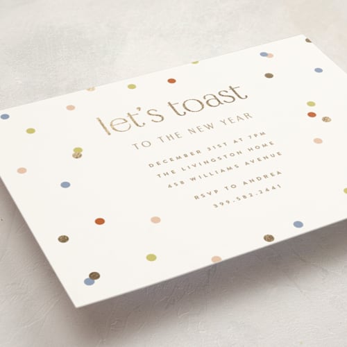 This is a pearl holiday party invitations with foil pressed by Ellen Schlegelmilch called let's toast printing on signature in standard