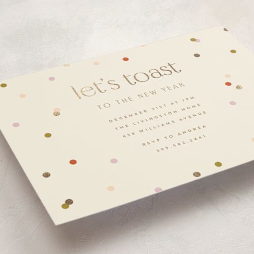 This is a cream holiday party invitations with foil pressed by Ellen Schlegelmilch called let's toast printing on signature in standard