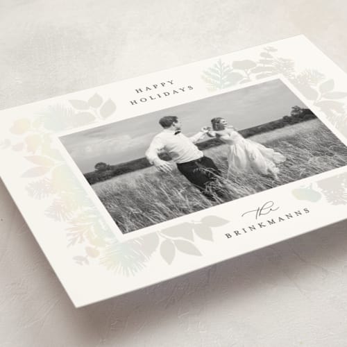 This is a snow gloss press holiday cards with gloss press by Brooke Chandler called joy greenery printing on signature in standard