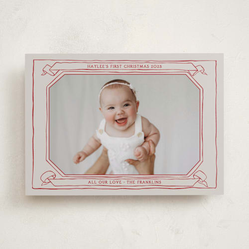 This is a berry babys first christmas with standard by Inkblot Design called scroll printing on recycled smooth signature in standard