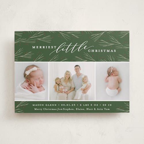This is a evergreen babys first christmas with standard by Sarah Brown called merriest little christmas printing on recycled smooth signature in standard