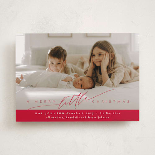This is a ruby babys first christmas with standard by Nicoletta Savod called littlest christmas gift printing on recycled smooth signature in standard