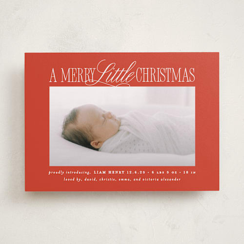 This is a poinsettia babys first christmas with standard by Brooke Chandler called littlest christmas printing on recycled smooth signature in standard