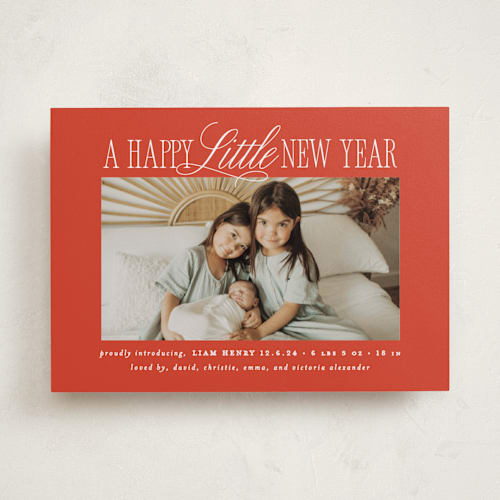 This is a poinsettia babys first christmas with standard by Brooke Chandler called littlest christmas printing on recycled smooth signature in standard