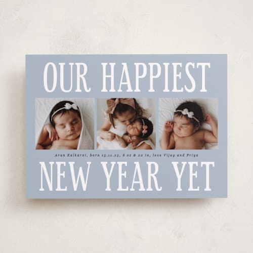 This is a powder blue babys first christmas with standard by Corinne Malesic called something kind of wonderful printing on recycled smooth signature in standard