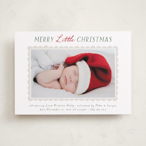 This is a holly babys first christmas with standard by Hooray Creative called merry scallop printing on recycled smooth signature in standard