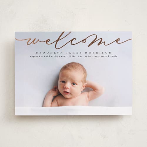 This is a charcoal foil stamped birth announcements with foil pressed by Erica Krystek called welcome ribbon printing on recycled smooth signature in standard