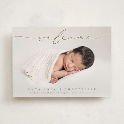 This is a fawn foil stamped birth announcements with foil pressed by Olivia Raufman called blissful welcome printing on recycled smooth signature in standard