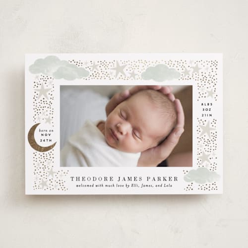 This is a mint foil stamped birth announcements with foil pressed by Alethea and Ruth called nighttime printing on recycled smooth signature in standard