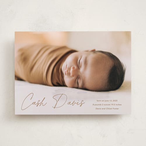 This is a rust birth announcements with standard by Stacey Meacham called swaddle printing on smooth signature in standard