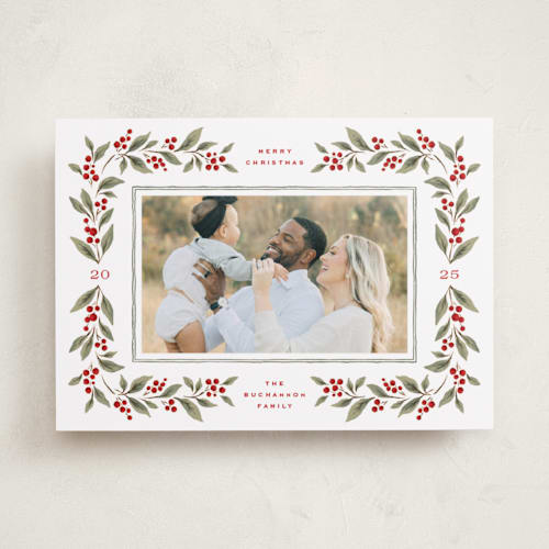 This is a mistletoe photo christmas cards with standard by Wildfield Paper Co called poinsettia + pine printing on recycled smooth signature in standard