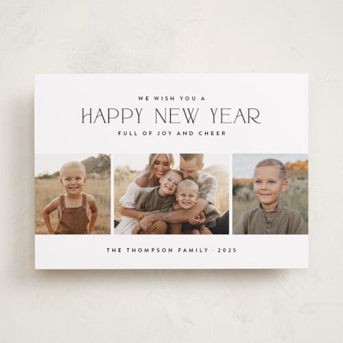 This is a ink photo christmas cards with standard by Wildfield Paper Co called holiday snapshots printing on recycled smooth signature in standard