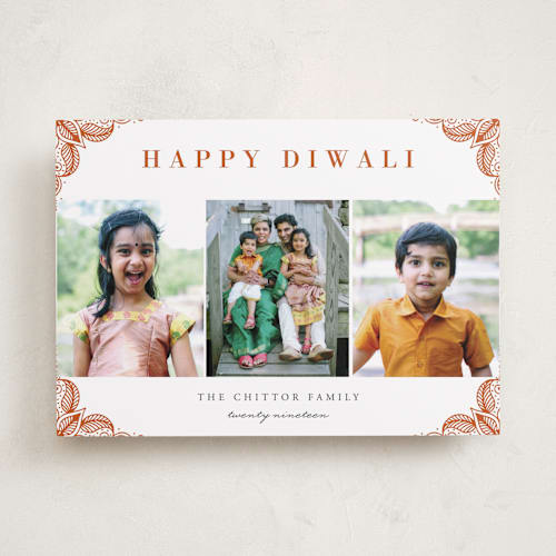 This is a rust diwali cards with standard by Oma N. Ramkhelawan called rangoli corners printing on recycled smooth signature in standard