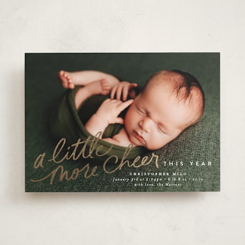 This is a cotton babys first christmas with foil pressed by Everett Paper Goods called more cheer now printing on recycled smooth signature in standard