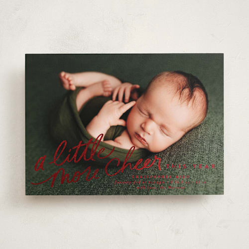 This is a candy apple babys first christmas with foil pressed by Everett Paper Goods called more cheer now printing on recycled smooth signature in standard