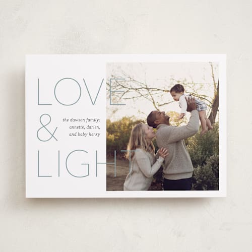 This is a lake hanukkah cards with standard by Laura Condouris called love and light printing on recycled smooth signature in standard