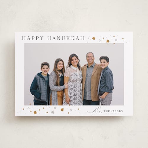 This is a candlelight hanukkah cards with standard by Laura Bercovich called sparkling printing on recycled smooth signature in standard
