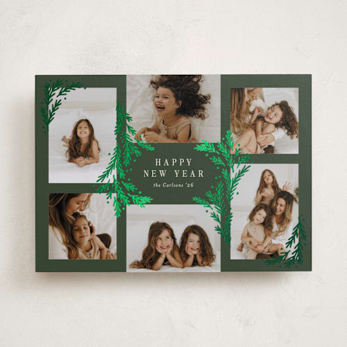 This is a forest foil pressed holiday cards with foil pressed by Michelle Taylor called gilded greenery printing on recycled smooth signature in standard