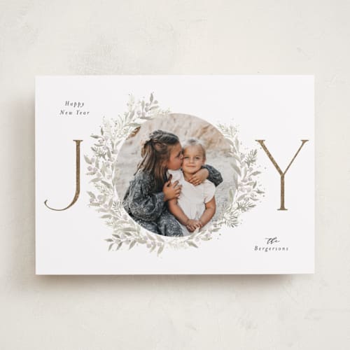 This is a sage foil pressed holiday cards with foil pressed by Itsy Belle Studio called joy wreath printing on recycled smooth signature in standard