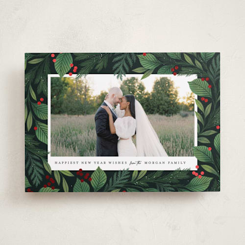 This is a forest foil pressed holiday cards with foil pressed by Paper Raven Co. called encircled printing on recycled smooth signature in standard