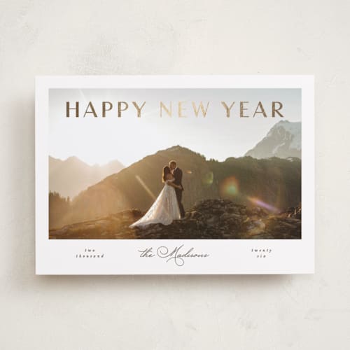 This is a linen foil pressed holiday cards with foil pressed by Vera Lim called nuovo printing on recycled smooth signature in standard