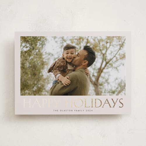 This is a parchment foil pressed holiday cards with foil pressed by Nicole Walsh called headliner printing on recycled smooth signature in standard