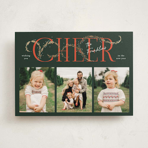 This is a pine foil pressed holiday cards with foil pressed by Paper Raven Co. called shimmering printing on recycled smooth signature in standard