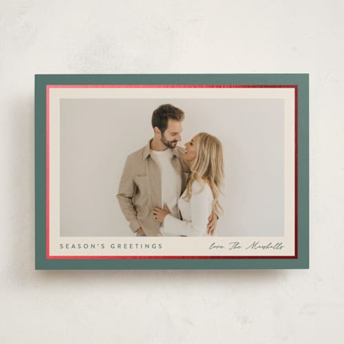 This is a holly sprig foil pressed holiday cards with foil pressed by Carolyn MacLaren called ribbon frame printing on recycled smooth signature in standard